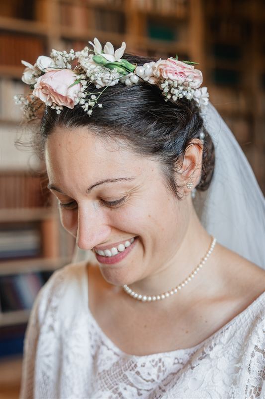 Bride with a flower crown and lace veil